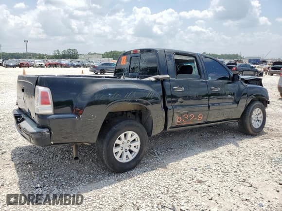 ✅ 2006 Mitsubishi Raider LS • VIN: 1Z7HC28K56S537699 • Лот: 59620255. Опубликован ранее на Copart с пробегом 194 133 миль. Бесплатный доступ к архиву аукционных продаж из США и подробный отчёт об истории автомобиля на DreamBid. Изображение 3.