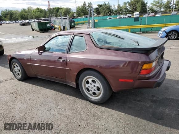 ✅ 1987 Porsche 944 • VIN: WP0AB0941HN470783 • Лот: 66232745. Опубликован ранее на Copart с пробегом 136 435 миль. Бесплатный доступ к архиву аукционных продаж из США и подробный отчёт об истории автомобиля на DreamBid. Изображение 2.