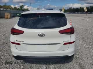 2019 Hyundai Tucson SE z VIN KM8J23A49KU881631, wystawiony jako Copart lot #84203555 z przebiegiem 138 425 mil mil oraz Czysty tytuł • Clean title. Historia ofert i sprzedaży dostępna na DreamBid. Obrazek 6.