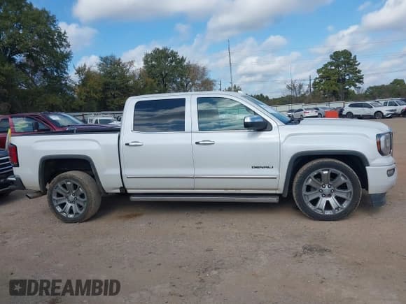 ✅ 2018 GMC Sierra 1500 Denali • VIN: 3GTU2PEJ6JG369769 • Лот: 43659971. Опубликован ранее на IAAI с пробегом 143 939 миль. Бесплатный доступ к архиву аукционных продаж из США и подробный отчёт об истории автомобиля на DreamBid. Изображение 13.