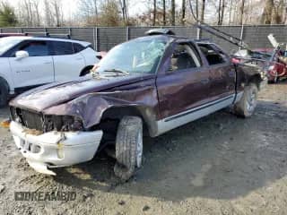 2004 Dodge Dakota SLT with VIN 1D7HL48K34S736938, listed as a Copart auction lot 85283154 with Not provided miles and Salvage title. Bid and sale history available at DreamBid. Image 1.