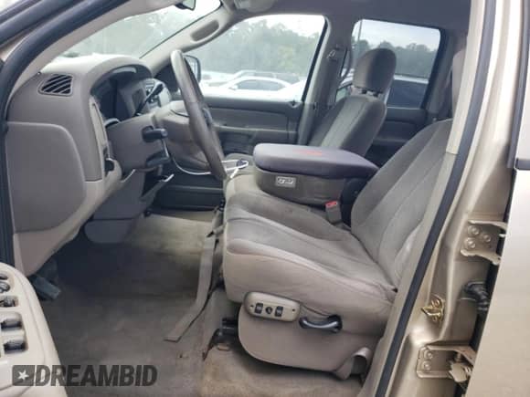 2004 Dodge 1500 SLT z VIN 1D7HA18D14S784671, wystawiony jako Copart lot #69988264 z przebiegiem 121 240 mil mil oraz Szkoda całkowita • Salvage title. Historia ofert i sprzedaży dostępna na DreamBid. Obrazek 7.