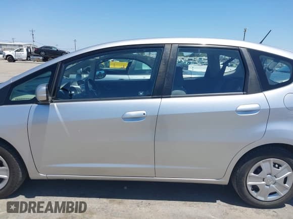✅ 2013 Honda Fit • VIN: JHMGE8G35DC064665 • Lot: 42676628. Listed on IAAI with 56,322 mi. Free auction sales archive from the USA and detailed vehicle history report at DreamBid. Image 14.