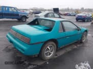 ✅ 1988 Pontiac Fiero • VIN: 1G2PE11R1JP210798 • Lot: 43472064. Wystawiony na IAAI z przebiegiem 136 233 mil. Bezpłatny archiwum sprzedaży aukcyjnych z USA i szczegółowy raport historii pojazdu na DreamBid. Zdjęcie 4.