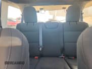 ✅ 2020 Jeep Wrangler Unlimited Sport • VIN: 1C4HJXDG4LW143969 • Lot: 86680385. Listed on Copart with 69,660 mi. Free auction sales archive from the USA and detailed vehicle history report at DreamBid. Image 10.