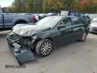 ✅ 2010 Toyota Camry XLE • VIN: JTNBK3EK2A3046388 • Лот: 82450825. Опубликован ранее на Copart с пробегом 154 015 миль. Бесплатный доступ к архиву аукционных продаж из США и подробный отчёт об истории автомобиля на DreamBid. Изображение 1.