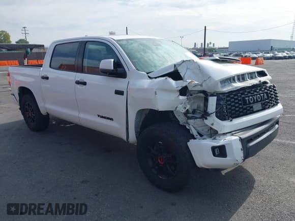 ✅ 2020 Toyota Tundra SR5 • VIN: 5TFDY5F16LX908407 • Lot: 43668429. Listed on IAAI with 87,009 mi. Free auction sales archive from the USA and detailed vehicle history report at DreamBid. Image 1.