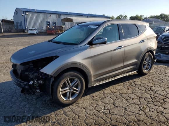 ✅ 2018 Hyundai Santa Fe 2.4L • VIN: 5NMZUDLB8JH067060 • Lot: 62051424. Wystawiony na Copart z przebiegiem 59 910 mil. Bezpłatny archiwum sprzedaży aukcyjnych z USA i szczegółowy raport historii pojazdu na DreamBid. Zdjęcie 1.