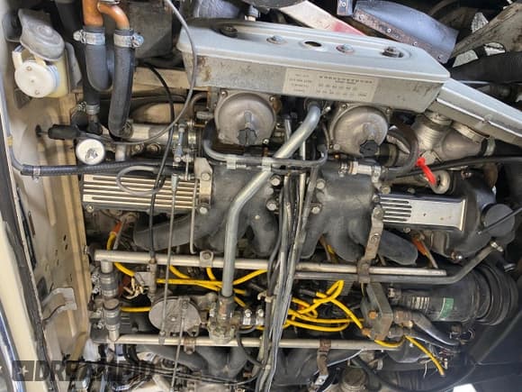 ✅ 1973 Jaguar E-Type • VIN: 1S21XXX • Lot: 63034995. Wystawiony na Copart z przebiegiem 33 118 mil. Bezpłatny archiwum sprzedaży aukcyjnych z USA i szczegółowy raport historii pojazdu na DreamBid. Zdjęcie 7.