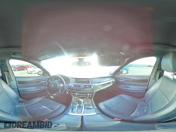 ✅ 2014 BMW 7 Series 740i • VIN: WBAYA6C54ED144402 • Lot: 63025295. Wystawiony na Copart z przebiegiem Nie podano. Bezpłatny archiwum sprzedaży aukcyjnych z USA i szczegółowy raport historii pojazdu na DreamBid. Zdjęcie 15.