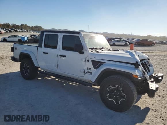 ✅ 2021 Jeep Gladiator Freedom • VIN: 1C6HJTAG8ML562950 • Lot: 91608665. Listed on Copart with 57,756 mi. Free auction sales archive from the USA and detailed vehicle history report at DreamBid. Image 4.