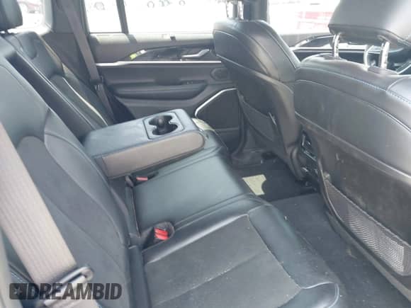 2022 Jeep Grand Cherokee Trailhawk with VIN 1C4RJYC68N8759961, listed as a IAAI auction lot 42589997 with 28,429 mi miles and . Bid and sale history available at DreamBid. Image 8.