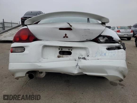 ✅ 2000 Mitsubishi Eclipse GT • VIN: 4A3AC54L2YE042887 • Лот: 85121084. Опубликован ранее на Copart с пробегом 99 333 миль. Бесплатный доступ к архиву аукционных продаж из США и подробный отчёт об истории автомобиля на DreamBid. Изображение 6.