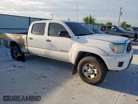 ✅ 2012 Toyota Tacoma PreRunner • VIN: 5TFKU4HN6CX002593 • Lot: 65340585. Listed on Copart with 172,284 mi. Free auction sales archive from the USA and detailed vehicle history report at DreamBid. Image 4.
