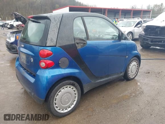 ✅ 2009 Smart fortwo Pure • VIN: WMEEJ31X69K312553 • Lot: 41957660. Listed on IAAI with 156,476 mi. Free auction sales archive from the USA and detailed vehicle history report at DreamBid. Image 4.