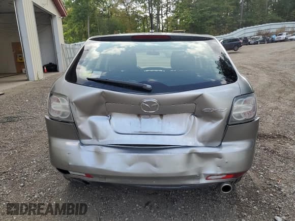 ✅ 2011 Mazda CX-7 i SV • VIN: JM3ER2AM8B0405428 • Лот: 71699545. Опубликован ранее на Copart с пробегом 181 016 миль. Бесплатный доступ к архиву аукционных продаж из США и подробный отчёт об истории автомобиля на DreamBid. Изображение 6.