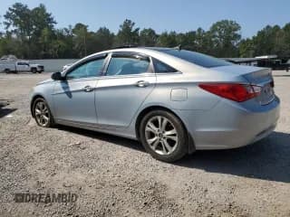 ✅ 2013 Hyundai Sonata SE • VIN: 5NPEC4AC2DH671322 • Lot: 66168114. Listed on Copart with 63,945 mi. Free auction sales archive from the USA and detailed vehicle history report at DreamBid. Image 2.