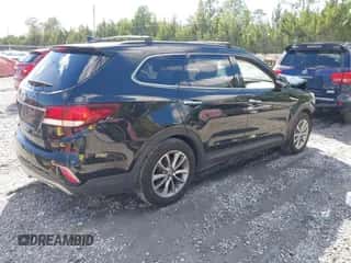 2017 Hyundai Santa Fe SE z VIN KM8SN4HFXHU237721, wystawiony jako IAAI lot #43580839 z przebiegiem 129 210 mil mil oraz . Historia ofert i sprzedaży dostępna na DreamBid. Obrazek 4.