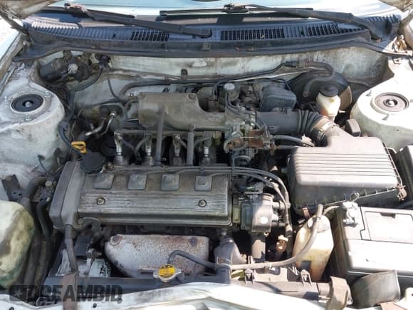 ✅ 1996 Toyota Corolla DX • VIN: 2T1BB02E6TC159935 • Lot: 42276048. Listed on IAAI with 214,431 mi. Free auction sales archive from the USA and detailed vehicle history report at DreamBid. Image 10.