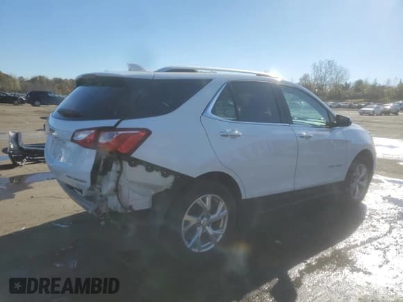 ✅ 2020 Chevrolet Equinox Premier • VIN: 3GNAXXEV9LS575229 • Lot: 86992825. Listed on Copart with 98,717 mi. Free auction sales archive from the USA and detailed vehicle history report at DreamBid. Image 3.