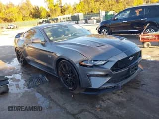 ✅ 2022 Ford Mustang GT • VIN: 1FA6P8CF9N5111974 • Lot: 43567663. Listed on IAAI with 26,474 mi. Free auction sales archive from the USA and detailed vehicle history report at DreamBid. Image 1.