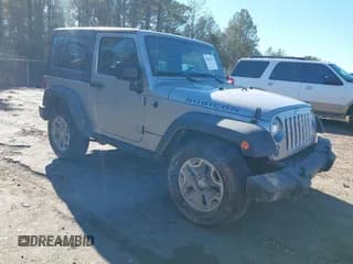 ✅ 2016 Jeep Wrangler Rubicon • VIN: 1C4BJWCGXGL307542 • Lot: 41407411. Listed on IAAI with 124,749 mi. Free auction sales archive from the USA and detailed vehicle history report at DreamBid. Image 1.