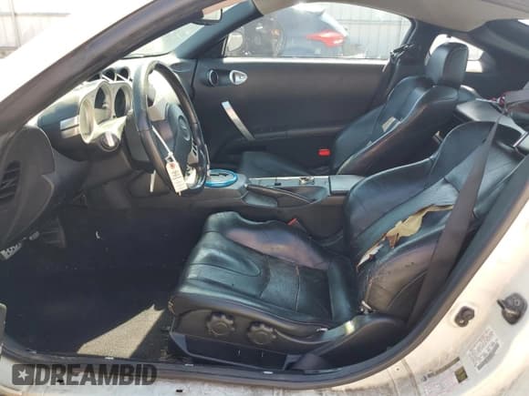 ✅ 2005 Nissan 350Z • VIN: JN1AZ34D05M604000 • Лот: 81687495. Опубликован ранее на Copart с пробегом 182 165 миль. Бесплатный доступ к архиву аукционных продаж из США и подробный отчёт об истории автомобиля на DreamBid. Изображение 7.