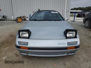 ✅ 1988 Mazda RX-7 • VIN: JM1FC3515J0102769 • Lot: 44539875. Wystawiony na Copart z przebiegiem 108 511 mil. Bezpłatny archiwum sprzedaży aukcyjnych z USA i szczegółowy raport historii pojazdu na DreamBid. Zdjęcie 5.