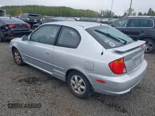 2005 Hyundai Accent GLS z VIN KMHCG35C85U362103, wystawiony jako IAAI lot #43453189 z przebiegiem 116 936 mil mil oraz . Historia ofert i sprzedaży dostępna na DreamBid. Obrazek 3.