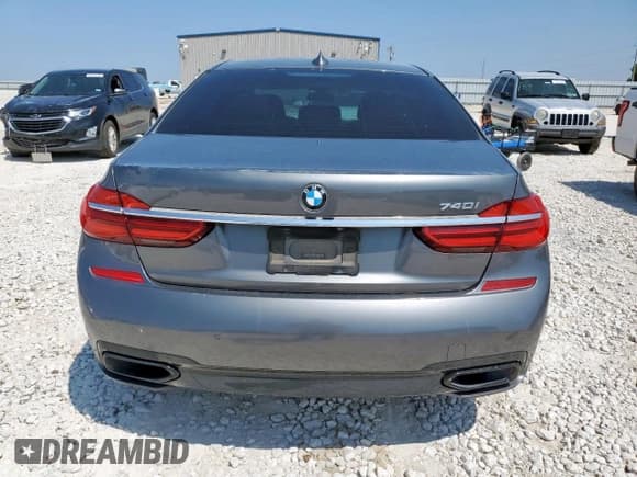 ✅ 2019 BMW 7 Series 740i • VIN: WBA7E2C57KB217956 • Lot: 80107095. Listed on Copart with 69,750 mi. Free auction sales archive from the USA and detailed vehicle history report at DreamBid. Image 6.
