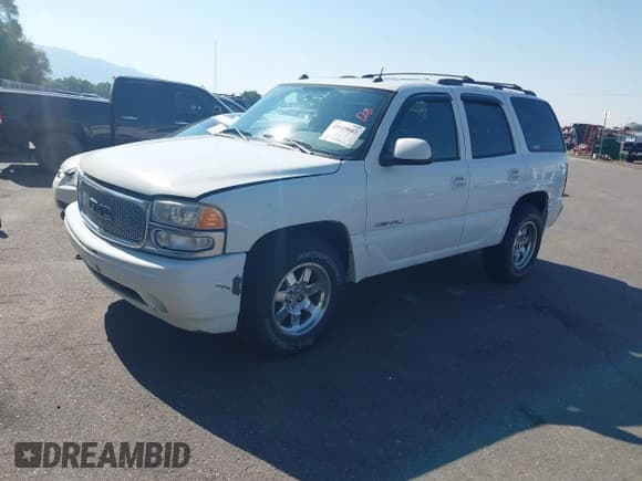 ✅ 2005 GMC Yukon Denali • VIN: 1GKEK63U55J250695 • Lot: 43119043. Listed on IAAI with 210,542 mi. Free auction sales archive from the USA and detailed vehicle history report at DreamBid. Image 2.