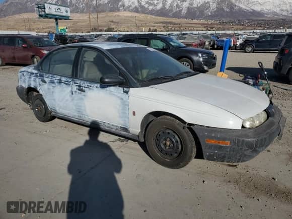 1998 Saturn SL z VIN 1G8ZF5287WZ120978, wystawiony jako Copart lot #43070995 z przebiegiem 279 889 mil mil oraz Szkoda całkowita • Salvage title. Historia ofert i sprzedaży dostępna na DreamBid. Obrazek 4.