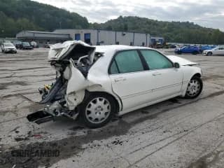 ✅ 2004 Acura RL w/Navigation System • VIN: JH4KA96684C001230 • Лот: 74801074. Опубликован ранее на Copart с пробегом 151 266 миль. Бесплатный доступ к архиву аукционных продаж из США и подробный отчёт об истории автомобиля на DreamBid. Изображение 3.