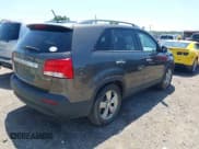 ✅ 2012 Kia Sorento EX • VIN: 5XYKU4A29CG293741 • Lot: 42535434. Listed on IAAI with 177,494 mi. Free auction sales archive from the USA and detailed vehicle history report at DreamBid. Image 4.