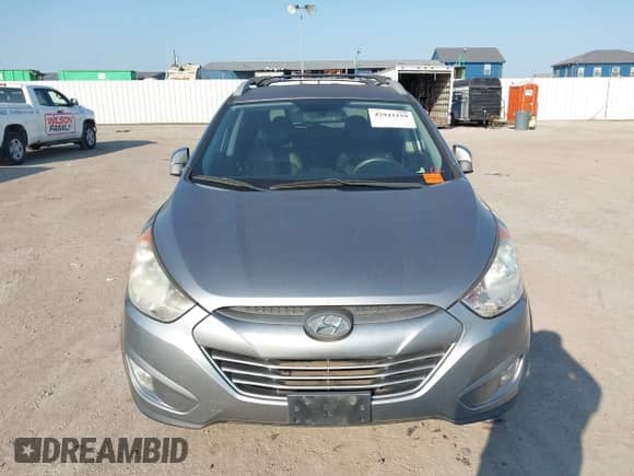 2013 Hyundai Tucson GLS z VIN KM8JU3AC4DU653198, wystawiony jako IAAI lot #42942159 z przebiegiem 212 645 mil mil oraz . Historia ofert i sprzedaży dostępna na DreamBid. Obrazek 6.
