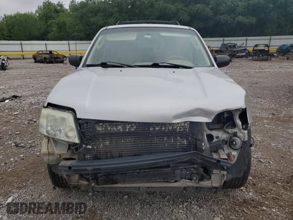 2006 Mercury Mariner Luxury z VIN 4M2CU56196KJ17209, wystawiony jako Copart lot #58450665 z przebiegiem 239 728 mil mil oraz Szkoda całkowita • Salvage title. Historia ofert i sprzedaży dostępna na DreamBid. Obrazek 5.