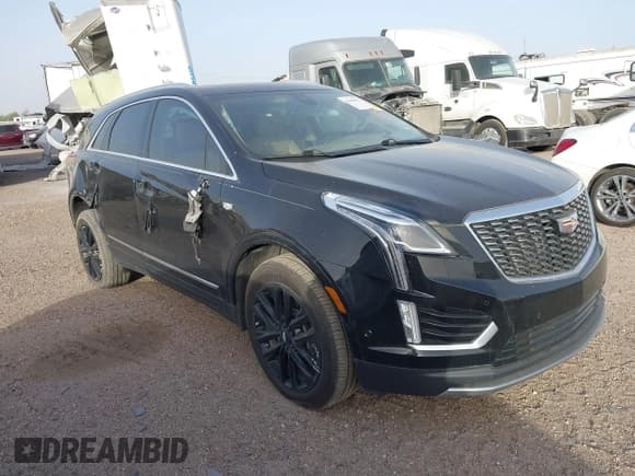✅ 2023 Cadillac XT5 FWD Premium Luxury • VIN: 1GYKNERS9PZ124408 • Lot: 41661872. Listed on IAAI with 31,295 mi. Free auction sales archive from the USA and detailed vehicle history report at DreamBid. Image 1.