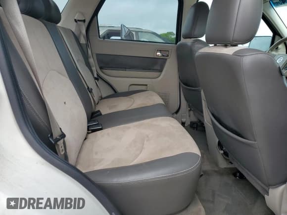 ✅ 2009 Mercury Mariner Premier • VIN: 4M2CU87G99KJ21818 • Лот: 60359645. Опубликован ранее на Copart с пробегом 173 639 миль. Бесплатный доступ к архиву аукционных продаж из США и подробный отчёт об истории автомобиля на DreamBid. Изображение 11.