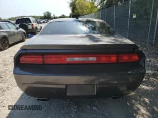 ✅ 2014 Dodge Challenger R/T 100th Anniversary Appearance • VIN: 2C3CDYBT8EH137458 • Lot: 70853314. Wystawiony na Copart z przebiegiem 61 411 mil. Bezpłatny archiwum sprzedaży aukcyjnych z USA i szczegółowy raport historii pojazdu na DreamBid. Zdjęcie 6.