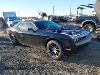 ✅ 2013 Dodge Challenger R/T • VIN: 2C3CDYBT1DH501055 • Lot: 41424579. Listed on IAAI with 156,492 mi. Free auction sales archive from the USA and detailed vehicle history report at DreamBid. Image 1.
