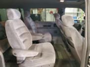 ✅ 1995 Plymouth Grand Voyager • VIN: 1P4GH54L6SX602545 • Lot: 81679604. Wystawiony na Copart z przebiegiem 179 453 mil. Bezpłatny archiwum sprzedaży aukcyjnych z USA i szczegółowy raport historii pojazdu na DreamBid. Zdjęcie 11.