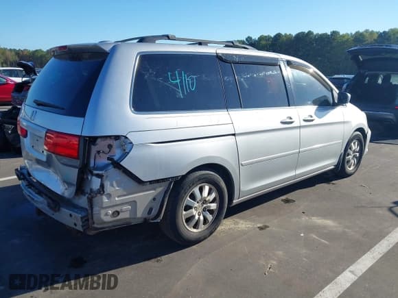 ✅ 2010 Honda Odyssey EX-L • VIN: 5FNRL3H72AB088330 • Lot: 43353573. Listed on IAAI with 229,734 mi. Free auction sales archive from the USA and detailed vehicle history report at DreamBid. Image 4.