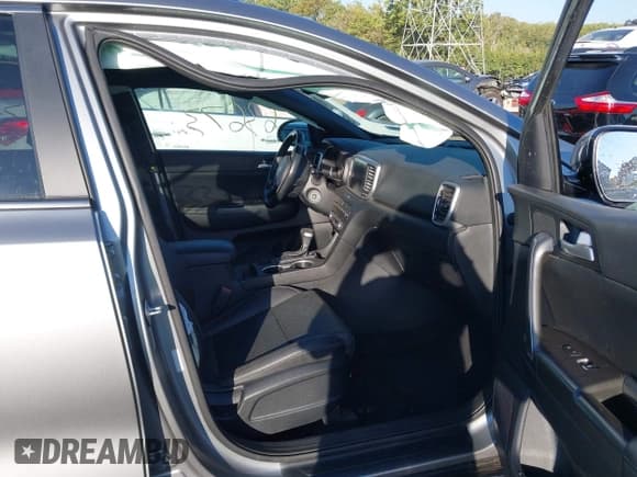 ✅ 2021 Kia Sportage S • VIN: KNDP63AC6M7857055 • Lot: 43333015. Listed on IAAI with 63,673 mi. Free auction sales archive from the USA and detailed vehicle history report at DreamBid. Image 5.