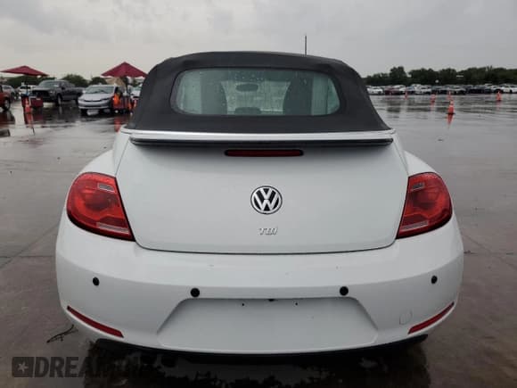 ✅ 2014 Volkswagen Beetle 2.0L TDI • VIN: 3VW5L7AT9EM823171 • Lot: 69486244. Listed on Copart with 65,557 mi. Free auction sales archive from the USA and detailed vehicle history report at DreamBid. Image 6.