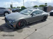 ✅ 2022 Bentley Continental GT GT V8 • VIN: SCBCG2ZG3NC093058 • Lot: 66557405. Listed on Copart with 9,760 mi. Free auction sales archive from the USA and detailed vehicle history report at DreamBid. Image 1.