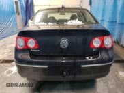 ✅ 2010 Volkswagen Passat Komfort • VIN: WVWJL7AN7AE057802 • Lot: 88630475. Listed on Copart with 74,676 mi. Free auction sales archive from the USA and detailed vehicle history report at DreamBid. Image 6.