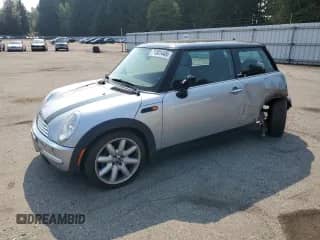 2003 MINI Hardtop with VIN WMWRC33443TJ50191, listed as a Copart auction lot 71501445 with 79,515 mi miles and Salvage title. Bid and sale history available at DreamBid. Image 1.