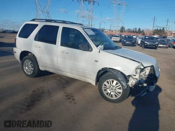2006 Mercury Mariner Luxury z VIN 4M2YU571X6DJ04235, wystawiony jako IAAI lot #41631062 z przebiegiem 290 925 mil mil oraz . Historia ofert i sprzedaży dostępna na DreamBid. Obrazek 1.