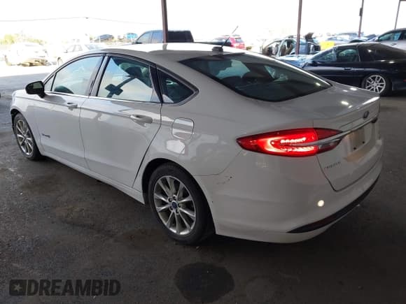 ✅ 2017 Ford Fusion Hybrid SE • VIN: 3FA6P0LU8HR315411 • Lot: 43804987. Listed on IAAI with 124,226 mi. Free auction sales archive from the USA and detailed vehicle history report at DreamBid. Image 3.