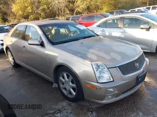 ✅ 2006 Cadillac STS • VIN: 1G6DW677460111457 • Lot: 43726542. Wystawiony na IAAI z przebiegiem 106 299 mil. Bezpłatny archiwum sprzedaży aukcyjnych z USA i szczegółowy raport historii pojazdu na DreamBid. Zdjęcie 1.